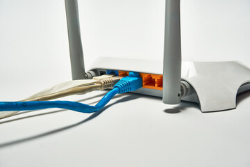 Connecting to a router, network cables connected to a router.