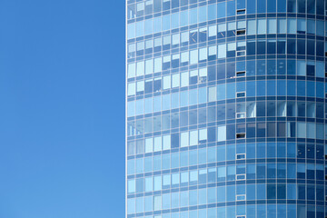 Fototapeta na wymiar High rise skyscraper against the blue sky