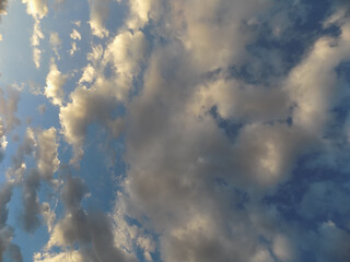 Blue sky with white clouds background 