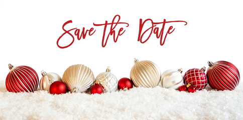 English Calligraphy Save The Date On Isolated White Backgroud. Red And White Festive Christmas Ball Ornament On Snow.