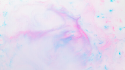 Fluid art texture. Pink blue background from liquid. Photography of colored spots on liquid. Abstract pattern