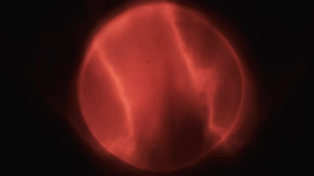 Excitement of red cloth in a spotlight. Slow motion.