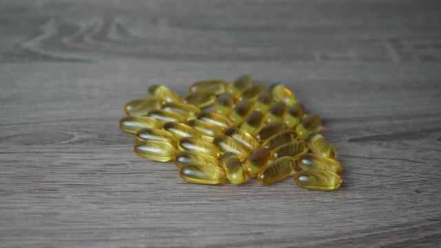 fish oil on a wooden table