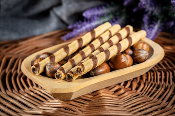 Sweet spiral tubes with nuts cream.