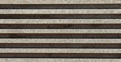 Concrete paver block with parallel slots