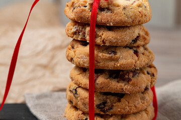 Cookies tied with red ribbon close-up