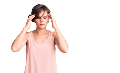 Beautiful young woman with short hair wearing casual style with sleeveless shirt with hand on head for pain in head because stress. suffering migraine.