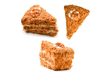 Peace of honey cake isolated on white background.