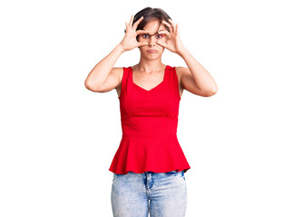 Beautiful young woman with short hair wearing casual style with sleeveless shirt trying to open eyes with fingers, sleepy and tired for morning fatigue