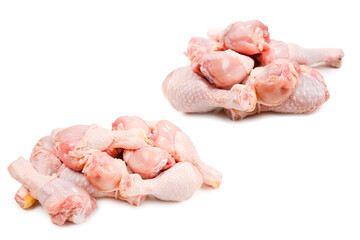 Tasty raw chicken legs. Top view. Isolated on white
