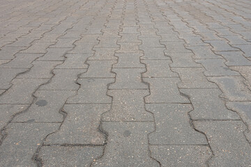 abstract background of tiles on the track in the park close up