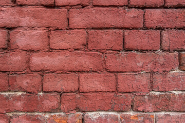 abstract background of an old red brick wall close up