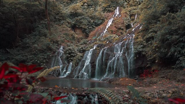 Pucak Manik Waterfall is one of the most beautiful waterfalls in Bali located in Singaraja. Bali, Indonesia. 4K