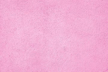 Abstract pink stucco texture background. Plastered building wall.