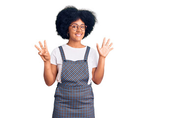 Young african american girl wearing casual clothes showing and pointing up with fingers number eight while smiling confident and happy.