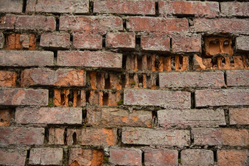 old broken brick wall red