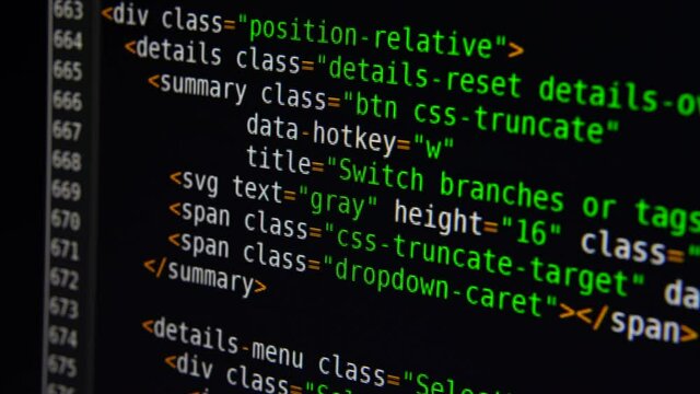 The program text moves on the computer screen. Macro shooting of computer display