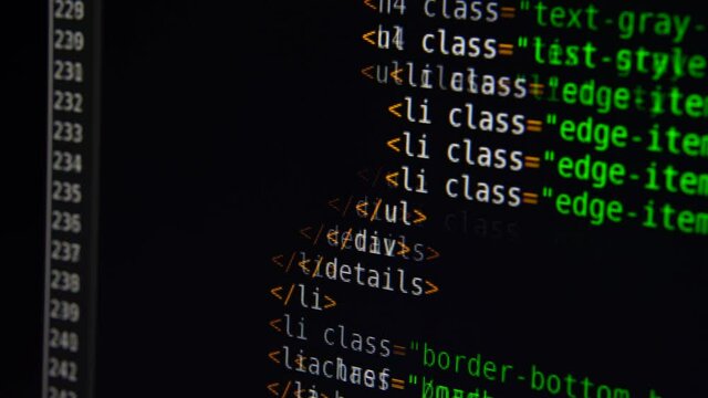The program text moves on the computer screen. Macro shooting of computer display