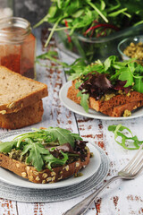 Sandwiches with pesto and green salad