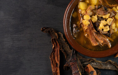 Soup with meat, potatoes, pearl barley and porcini mushrooms.
