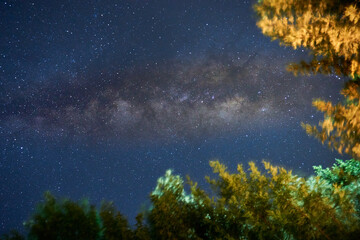 Fototapeta na wymiar sky with milkyway, stars and clouds