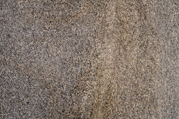 Abstract background of grey tiled walkway in a park