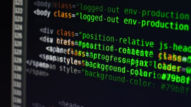 The program text moves on the computer screen. Macro shooting of computer display