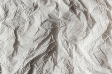wadded up paper and straitend napkin background,white