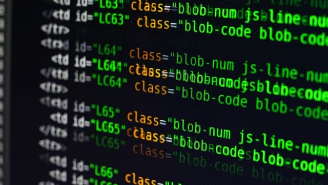 The program text moves on the computer screen. Macro shooting of computer display