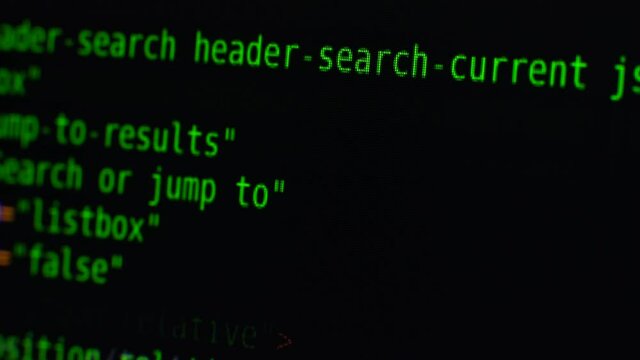 The program text moves on the computer screen. Macro shooting of computer display
