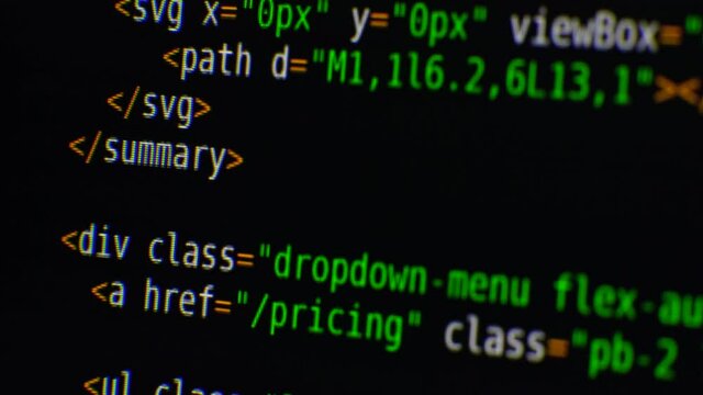 The program text moves on the computer screen. Macro shooting of computer display