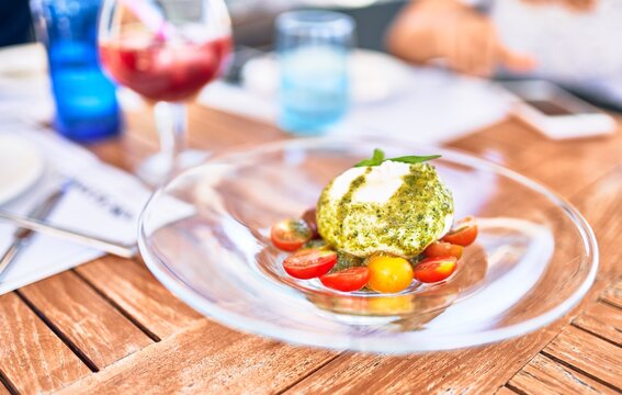 Delicious dish of tomato and burrata cheese salad