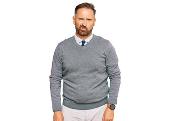 Fototapeta premium Handsome middle age man wearing business clothes skeptic and nervous, frowning upset because of problem. negative person.