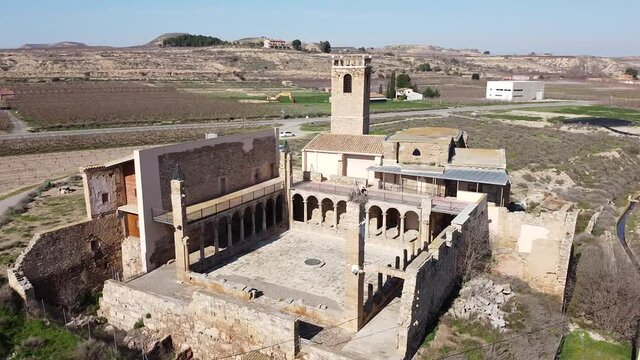 View from drone of ancient ruined monastery of Avinganya near Catalan city of Seros on spring sunny day, Spain