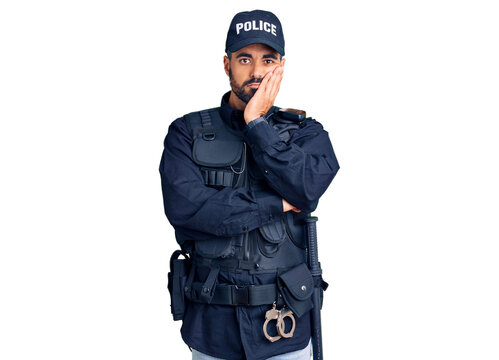 Young hispanic man wearing police uniform thinking looking tired and bored with depression problems with crossed arms.