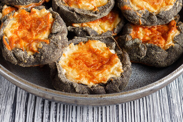Finnish Karelian pies made of rye dough with potatoes and cheese.