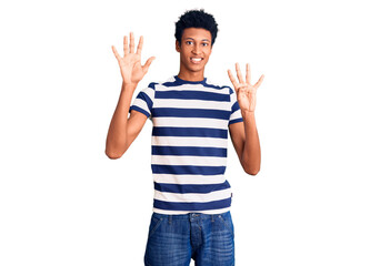 Young african american man wearing casual clothes showing and pointing up with fingers number nine while smiling confident and happy.