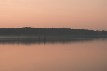 Great colourful sunrise on a calm lake