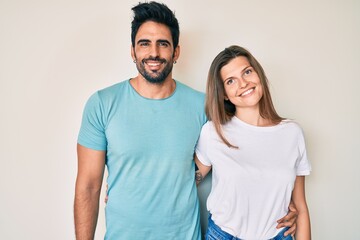 Fototapeta premium Beautiful young couple of boyfriend and girlfriend together with a happy and cool smile on face. lucky person.