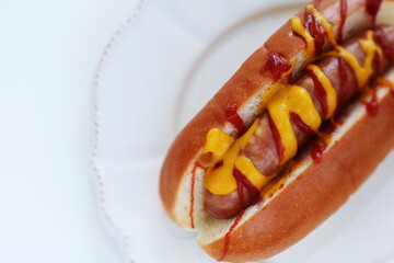 homemade comfort food, ketchup and mustard sauce hot dog