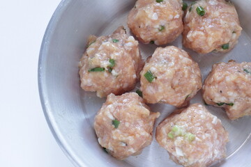 Homemade scallion and green onion meat ball on pan for Chinese cooking