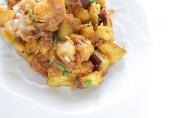 Korean food, braised sweet potato and scallop with copy space