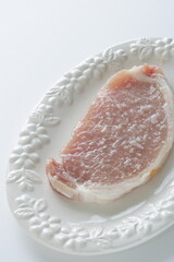 Japanese cooking, rice yeast and pork on dish with copy space