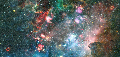 Spiral nebula and light ray in deep space. Elements of this image furnished by NASA