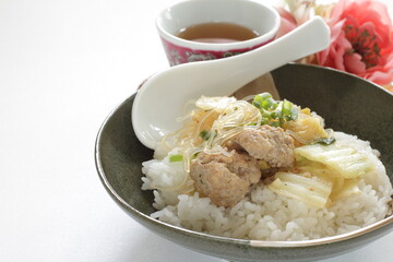 Chinese food, cabbage and meat ball braised on rice