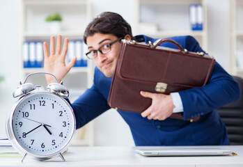 Businessman in bad time management concept