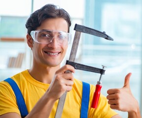 Furniture carpenter working in the workshop