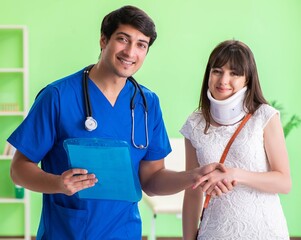 Female patient visiting male doctor in medical concept