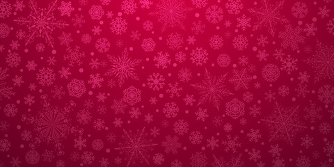 Obraz na płótnie Canvas Christmas background of various complex big and small snowflakes, in red colors