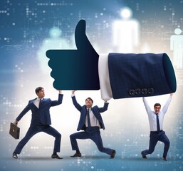 Businessmen supporting thumbs up gesture